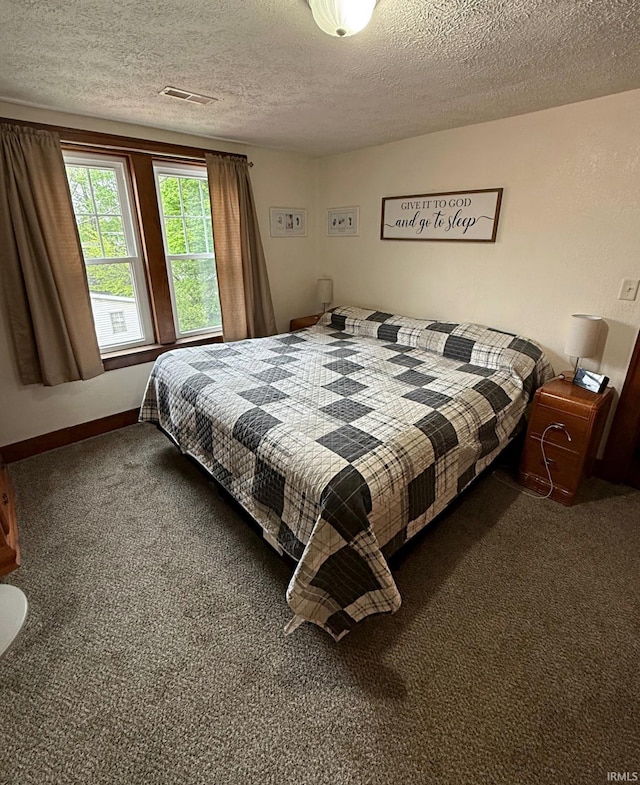 110 W Elnora St, Odon, IN 47562 - carpeted bedroom featuring a textured ceiling