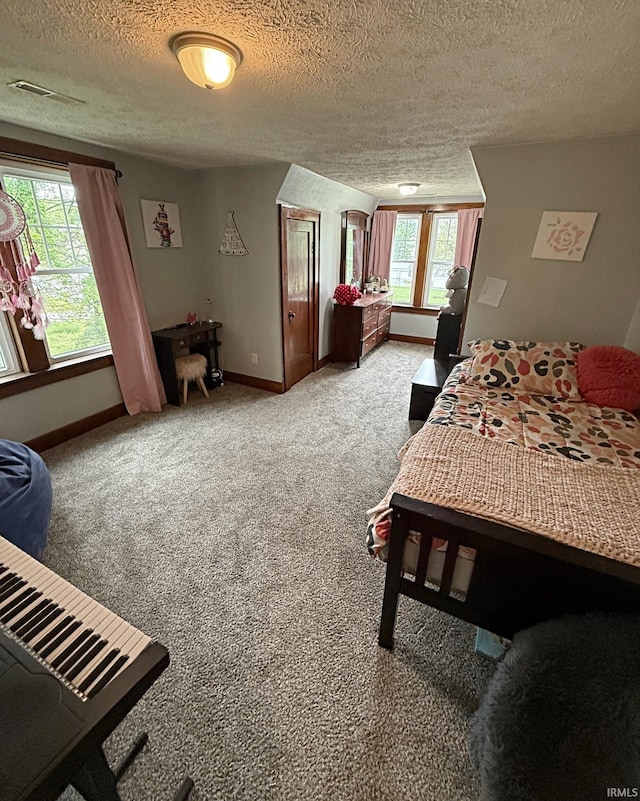 110 W Elnora St, Odon, IN 47562 - bedroom featuring light carpet, baseboards, and a textured ceiling