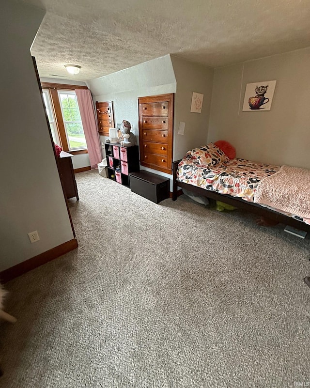 110 W Elnora St, Odon, IN 47562 - carpeted bedroom featuring a textured ceiling and baseboards