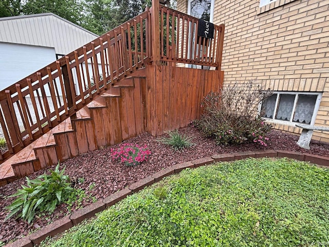 110 W Elnora St, Odon, IN 47562 - view of yard featuring stairway, an outdoor structure, and a wooden deck