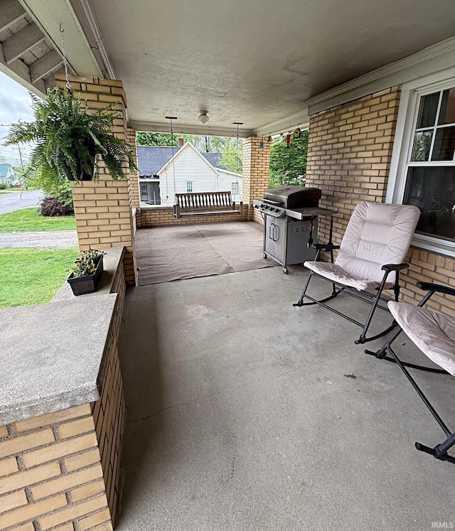 110 W Elnora St, Odon, IN 47562 - view of patio / terrace with area for grilling and a porch