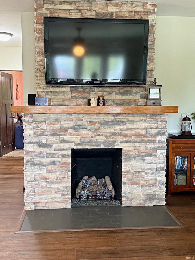 110 W Elnora St, Odon, IN 47562 - detailed view of wood finished floors and a fireplace