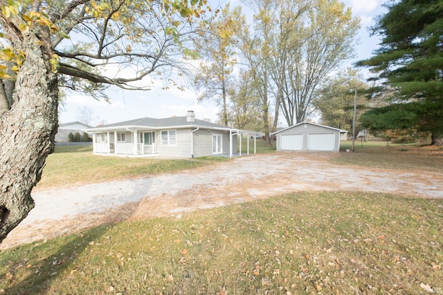 view of front of house featuring a garage, an outdoor structure, a porch, a front lawn, and a chimney