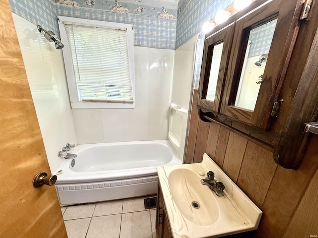 219 W Boone St, Gentryville, IN 47537 - full bathroom with wallpapered walls, tile patterned flooring, a sink, and shower / tub combination