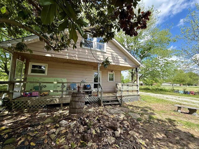 219 W Boone St, Gentryville, IN 47537 - back of house with a wooden deck