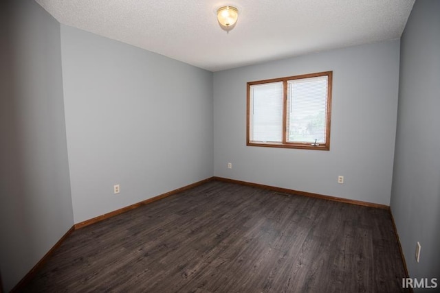 10217 Lake Tahoe Ct, Fort Wayne, IN 46804 - unfurnished room featuring dark wood-style flooring and baseboards
