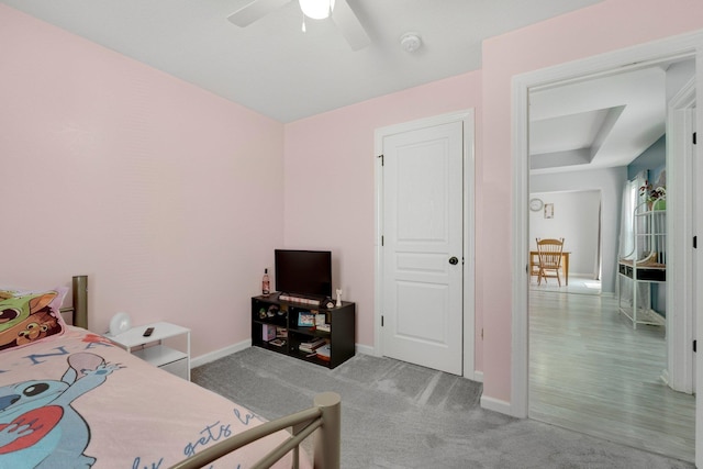 13726 Hamilton Meadows Ln, Fort Wayne, IN 46814 - carpeted bedroom with baseboards and ceiling fan