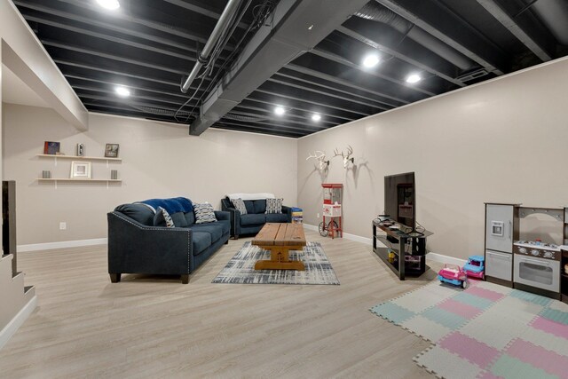 13726 Hamilton Meadows Ln, Fort Wayne, IN 46814 - living room featuring baseboards and wood finished floors