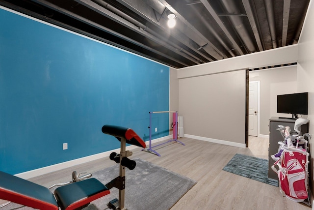 13726 Hamilton Meadows Ln, Fort Wayne, IN 46814 - exercise room featuring wood finished floors and baseboards