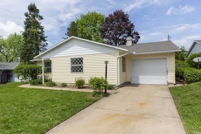 single story home with a garage, a chimney, a front yard, and driveway