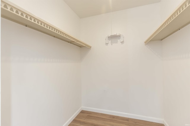 walk in closet featuring light wood-type flooring