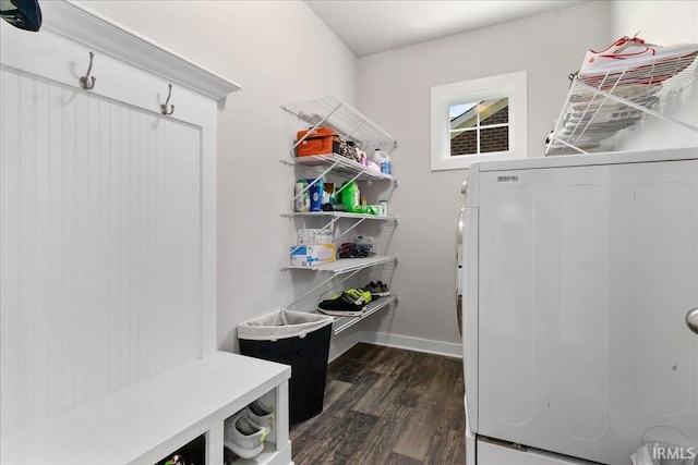 mudroom featuring washer / dryer, dark wood-style floors, and baseboards