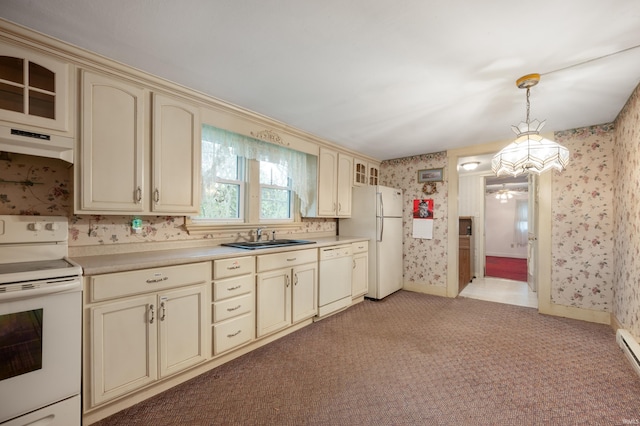 kitchen featuring cream cabinets, white appliances, wallpapered walls, under cabinet range hood, and light carpet