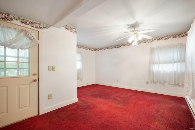 carpeted empty room featuring baseboard heating, ceiling fan, and baseboards