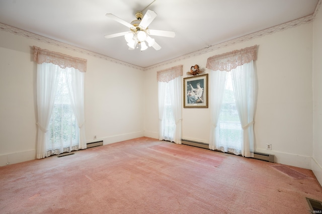 carpeted empty room featuring a ceiling fan