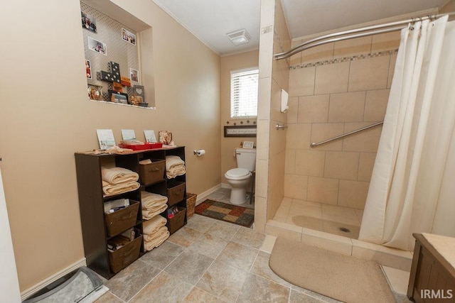 12067 E Bedrock Ln, Springville, IN 47462 - full bath featuring toilet, crown molding, tiled shower, and baseboards