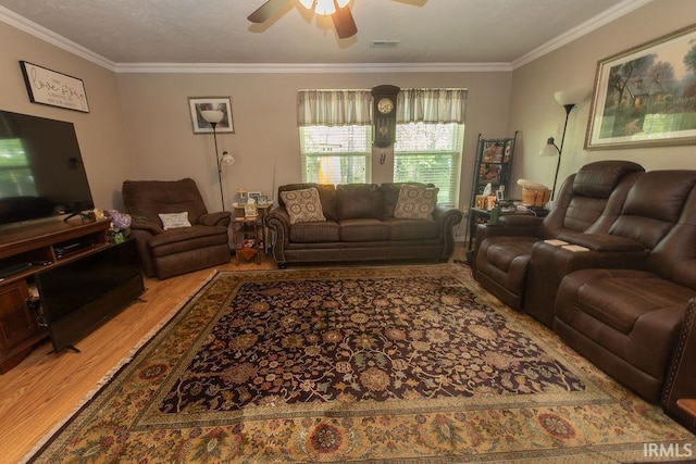 12067 E Bedrock Ln, Springville, IN 47462 - living area featuring wood finished floors, crown molding, and ceiling fan