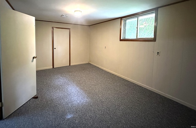 unfurnished room featuring baseboards