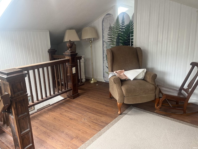 2515 Hubertus Ave, Fort Wayne, IN 46805 - living area featuring an upstairs landing, lofted ceiling, and wood finished floors