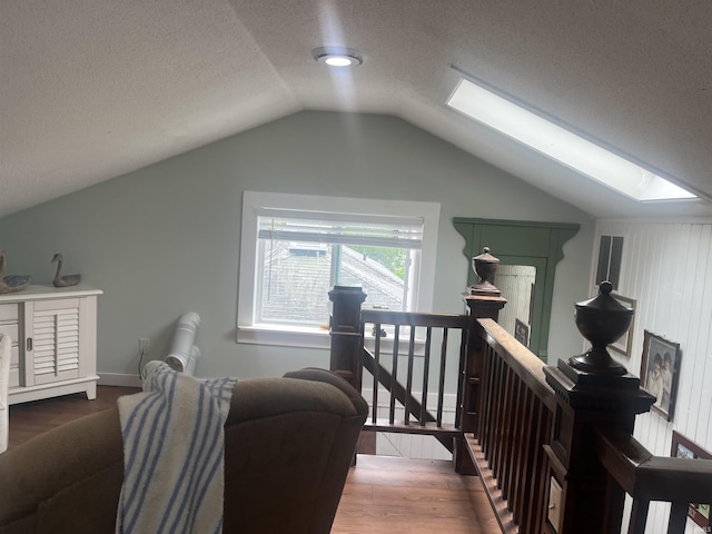 2515 Hubertus Ave, Fort Wayne, IN 46805 - bonus room featuring a skylight, wood finished floors, lofted ceiling, and a textured ceiling