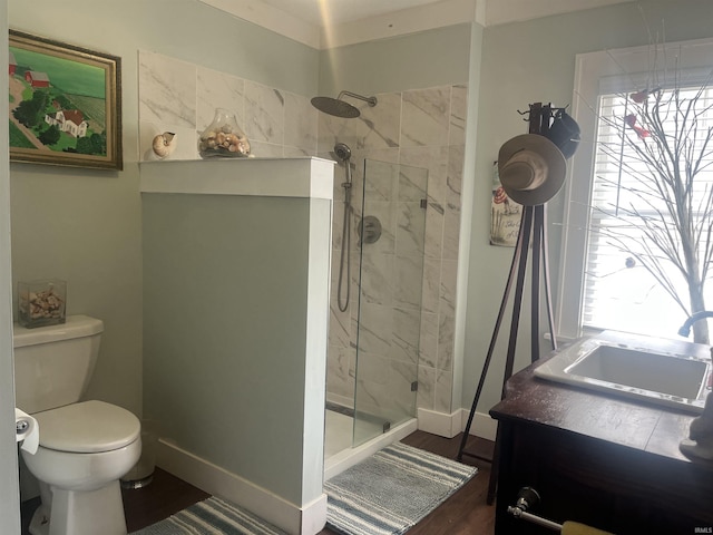 2515 Hubertus Ave, Fort Wayne, IN 46805 - full bath featuring a stall shower, toilet, vanity, wood finished floors, and baseboards