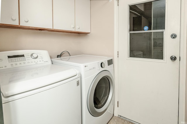 1005 E Buckingham Dr, Bloomington, IN 47401 - clothes washing area featuring cabinet space and washer and dryer