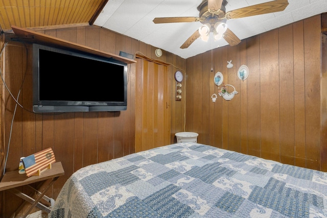 7950 E Metz Rd, Angola, IN 46703 - bedroom featuring wood walls, lofted ceiling, and a ceiling fan