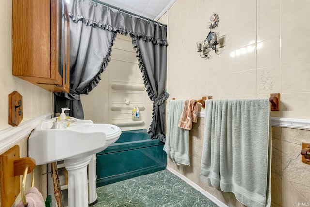 7950 E Metz Rd, Angola, IN 46703 - bathroom with shower / tub combo with curtain and tile walls