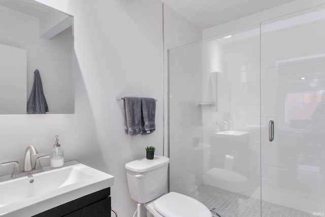 full bath with toilet, a stall shower, and vanity