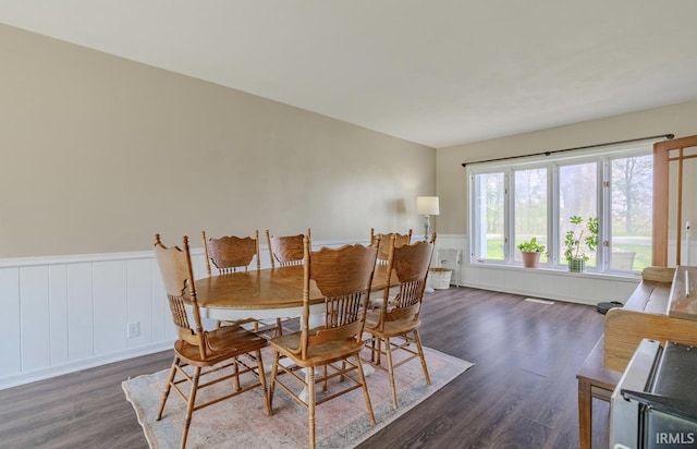 7325 E State Road 218, Lafontaine, IN 46940 - dining area featuring a wainscoted wall and dark wood-style flooring