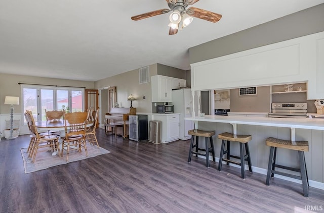 7325 E State Road 218, Lafontaine, IN 46940 - dining area with dark wood-style flooring and ceiling fan