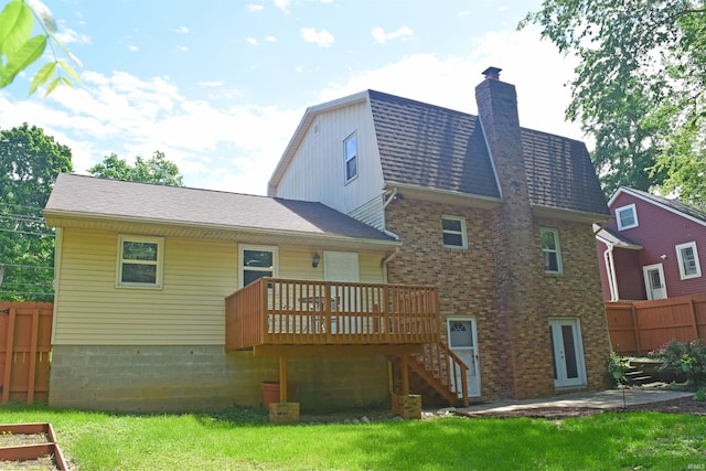 back of property featuring stairs, a deck, a chimney, and roof with shingles
