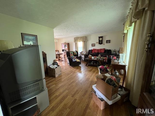 3800 S 175 W, Lafayette, IN 47909 - living room featuring wood finished floors and a textured ceiling