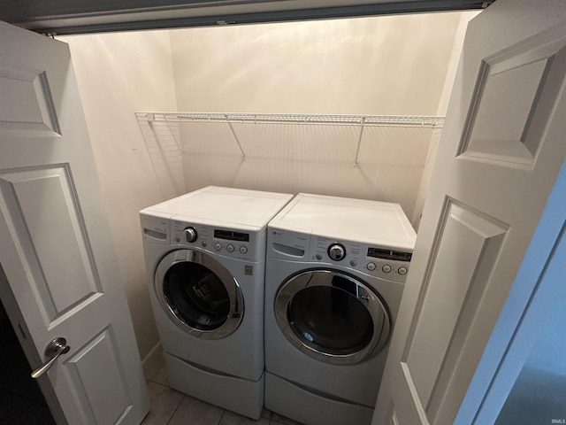 washroom featuring separate washer and dryer