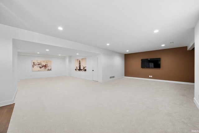 15171 Gossamer Trl, Granger, IN 46530 - finished below grade area with recessed lighting, light colored carpet, and baseboards