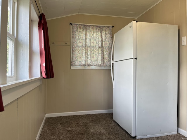 7374 W Upper Bensart Dr, Claypool, IN 46510 - kitchen featuring freestanding refrigerator, vaulted ceiling, ornamental molding, baseboards, and carpet flooring