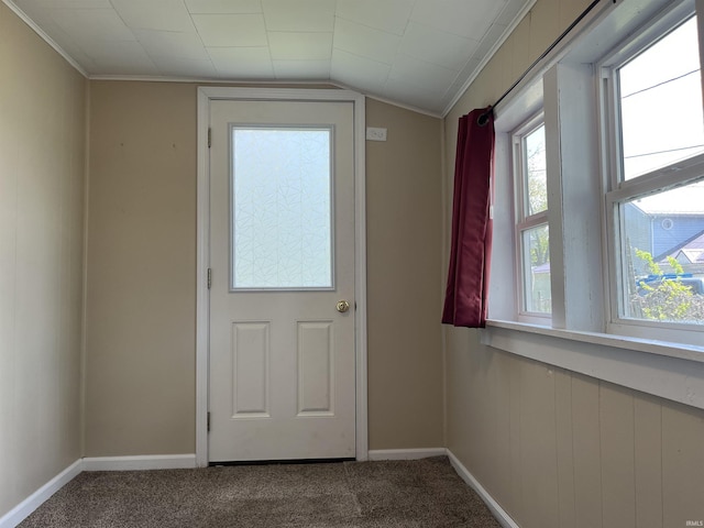 7374 W Upper Bensart Dr, Claypool, IN 46510 - entryway featuring carpet, baseboards, ornamental molding, and vaulted ceiling