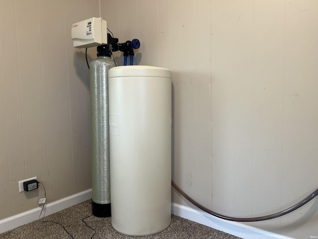 7374 W Upper Bensart Dr, Claypool, IN 46510 - detailed view of baseboards and a water softener