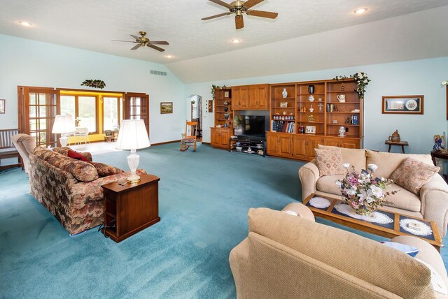 living room featuring carpet flooring, lofted ceiling, a ceiling fan, baseboards, and recessed lighting