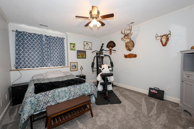 carpeted bedroom with crown molding, baseboards, and a ceiling fan