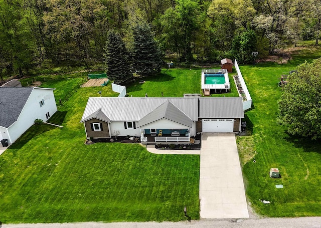 view from above of property featuring a pool area