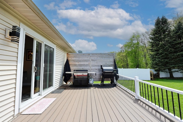 wooden deck with grilling area