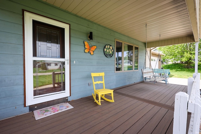 wooden deck featuring covered porch