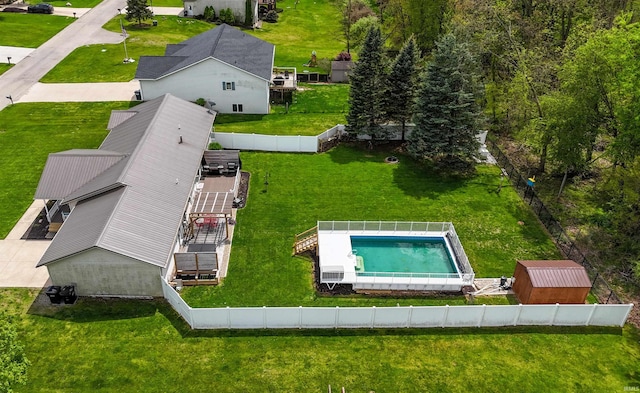 view of subject property featuring a pool