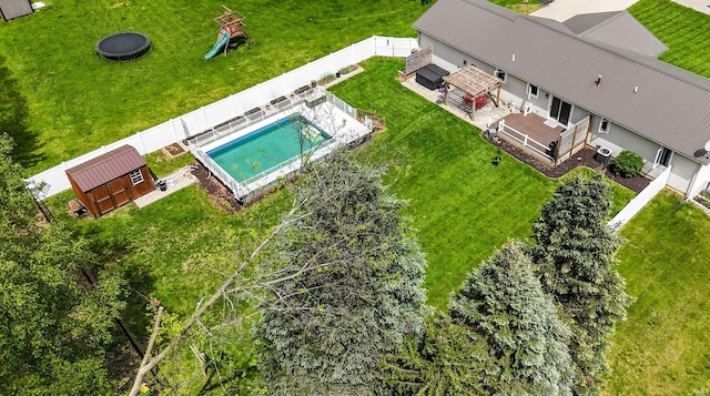 view from above of property with a pool area