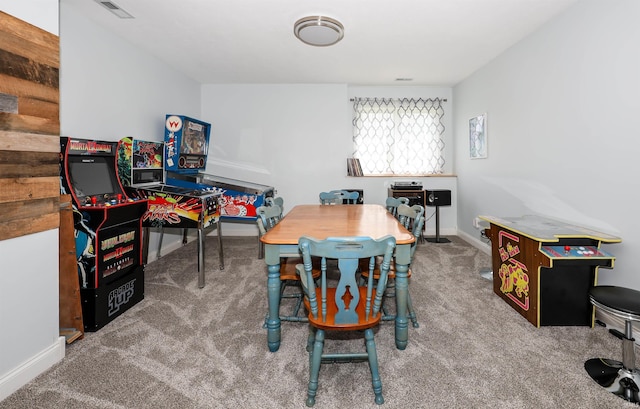 recreation room featuring carpet and baseboards