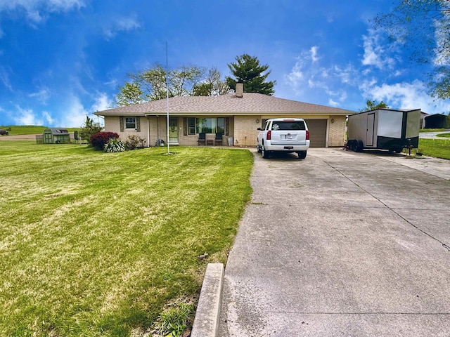 52 S 950 E, Greentown, IN 46936 - ranch-style house featuring driveway, a front lawn, and a chimney