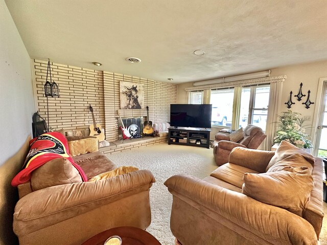 52 S 950 E, Greentown, IN 46936 - carpeted living room featuring brick wall