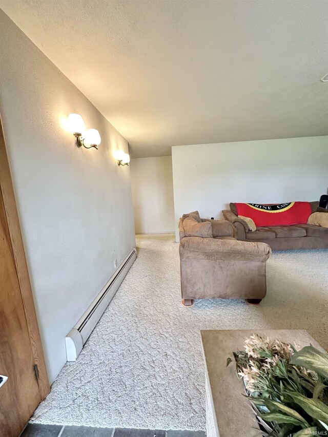 52 S 950 E, Greentown, IN 46936 - living room with baseboard heating and carpet floors