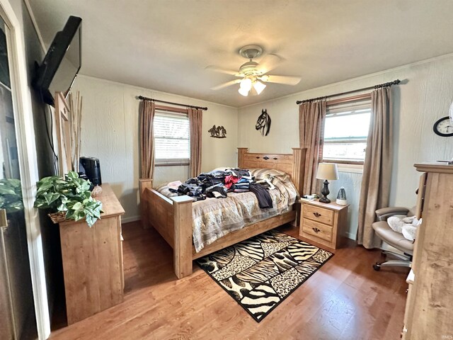 52 S 950 E, Greentown, IN 46936 - bedroom featuring wood finished floors and ceiling fan
